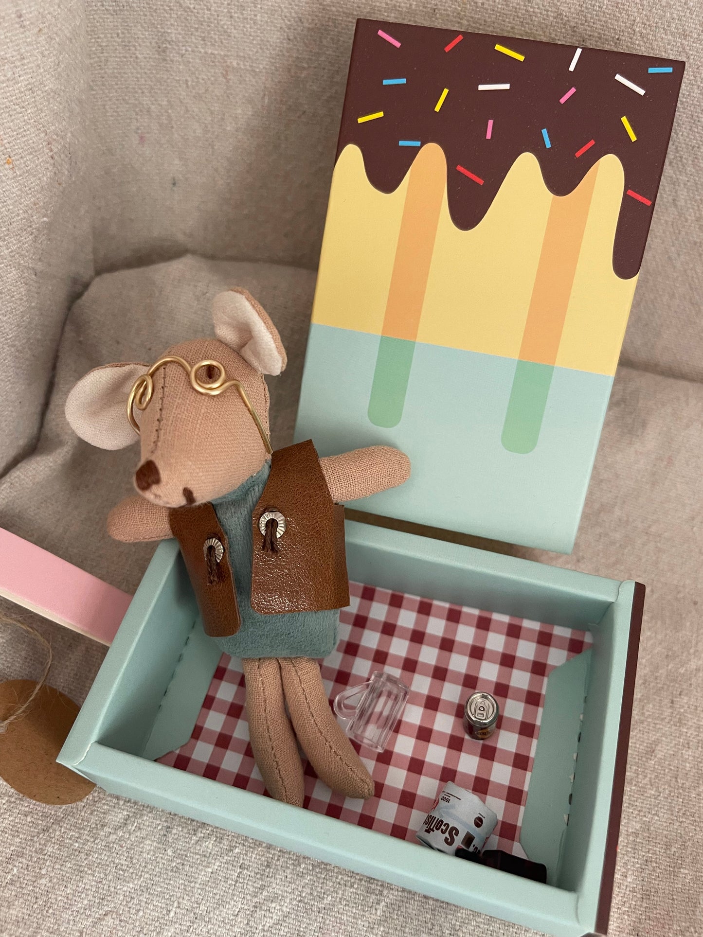 Mousicle - Sweet Treat Box with a Man Mouse House along with some accessories.